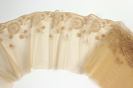 Beautiful flesh-colored stable embroidery on tulle 0.5 m